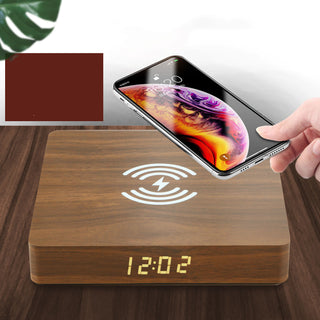 Alternative image text for the "Wooden Phone Wireless Charger" could be:  "A sleek and stylish wooden wireless charger for smartphones. The charger features a natural wood finish and wireless charging capability. Keep your phone charged in style with this elegant accessory."